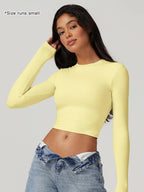 T-shirt sportiva da donna a girocollo tinta unita a compressione
