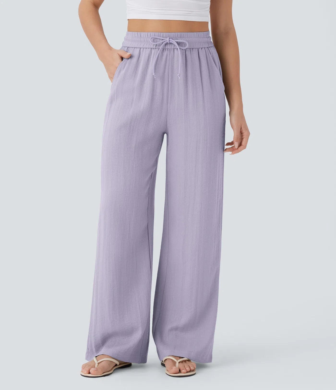 Pantalon ample taille haute en lin avec cordon de serrage et grandes poches