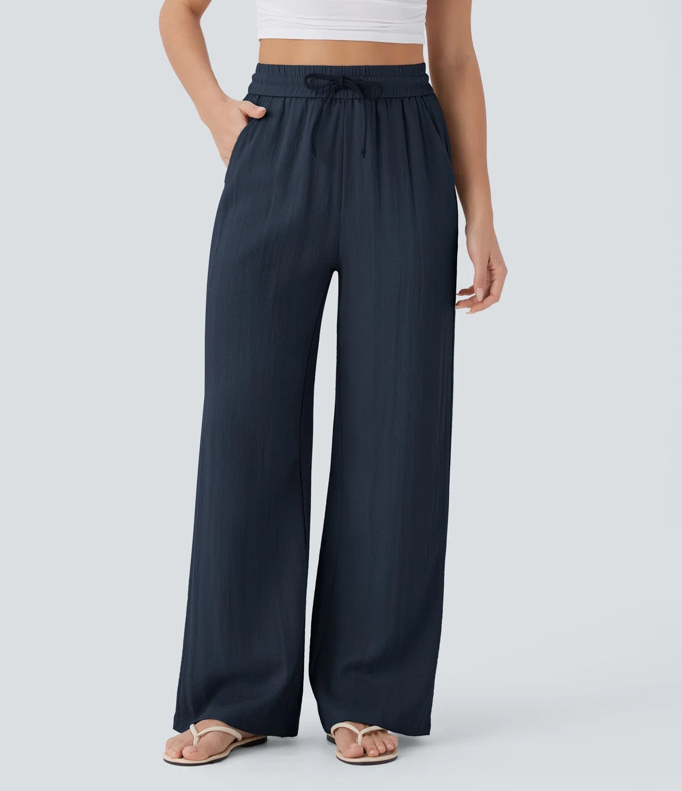 Pantalon ample taille haute en lin avec cordon de serrage et grandes poches
