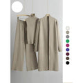 Ensemble trois pièces tendance : débardeur à col roulé en maille, pantalon large et cardigan long ouvert, vêtements décontractés pour femme