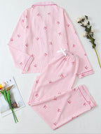 Pigiama da donna a maniche lunghe a righe con stampa a fiocco, grazioso set con parte superiore abbottonata e pantaloni, abbigliamento casual per la casa per tutte le stagioni