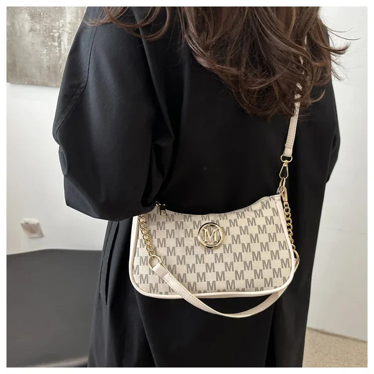 Borsa a mezzaluna di tendenza per donna