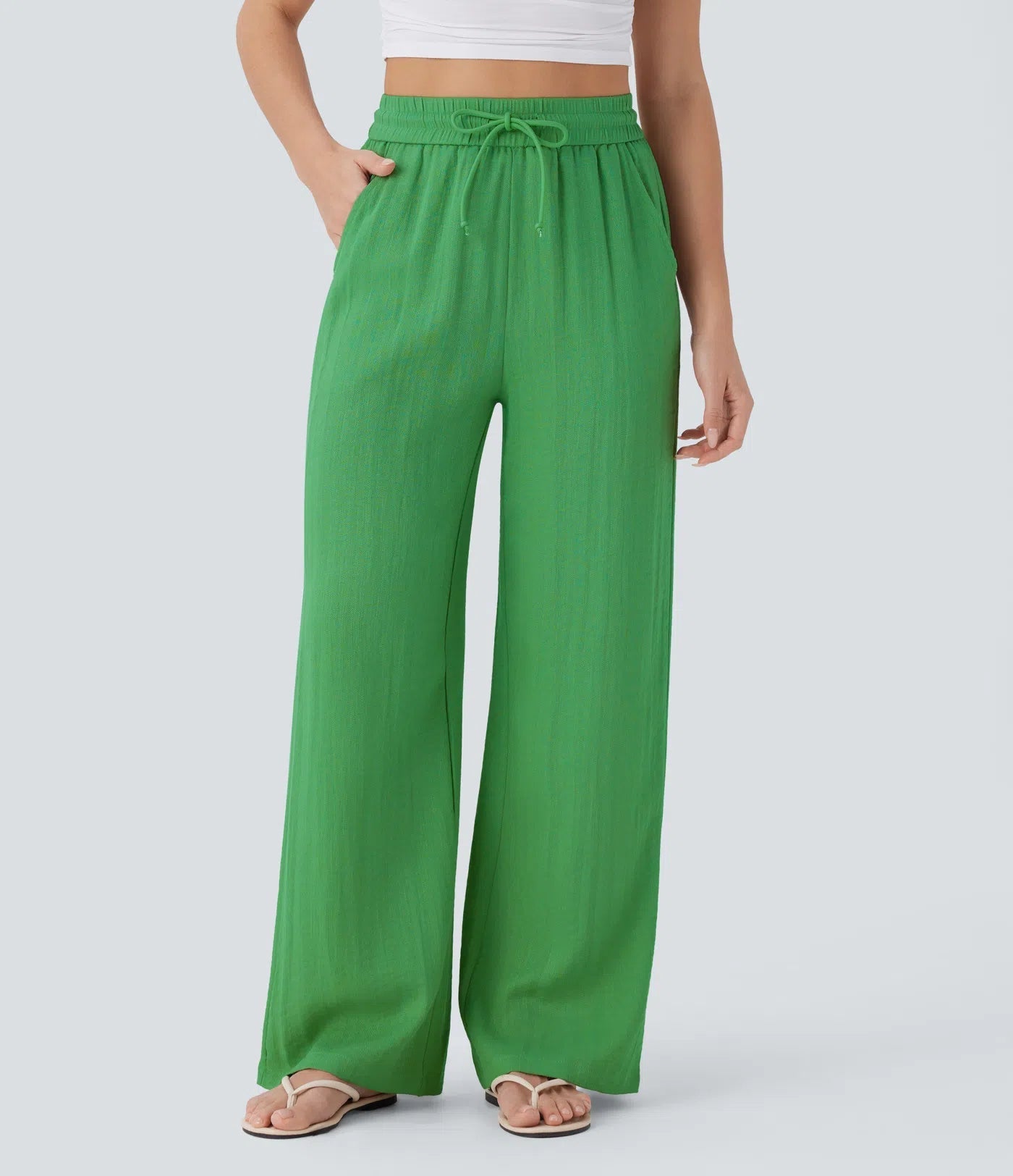 Pantalon ample taille haute en lin avec cordon de serrage et grandes poches