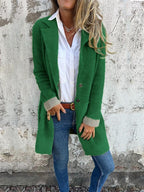 Manteau long à revers en fausse fourrure pour femme