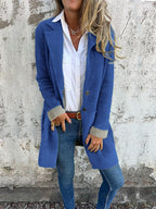 Manteau long à revers en fausse fourrure pour femme
