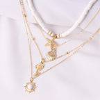 Ensemble de colliers étoiles de mer et coquillages vintages en argile molle