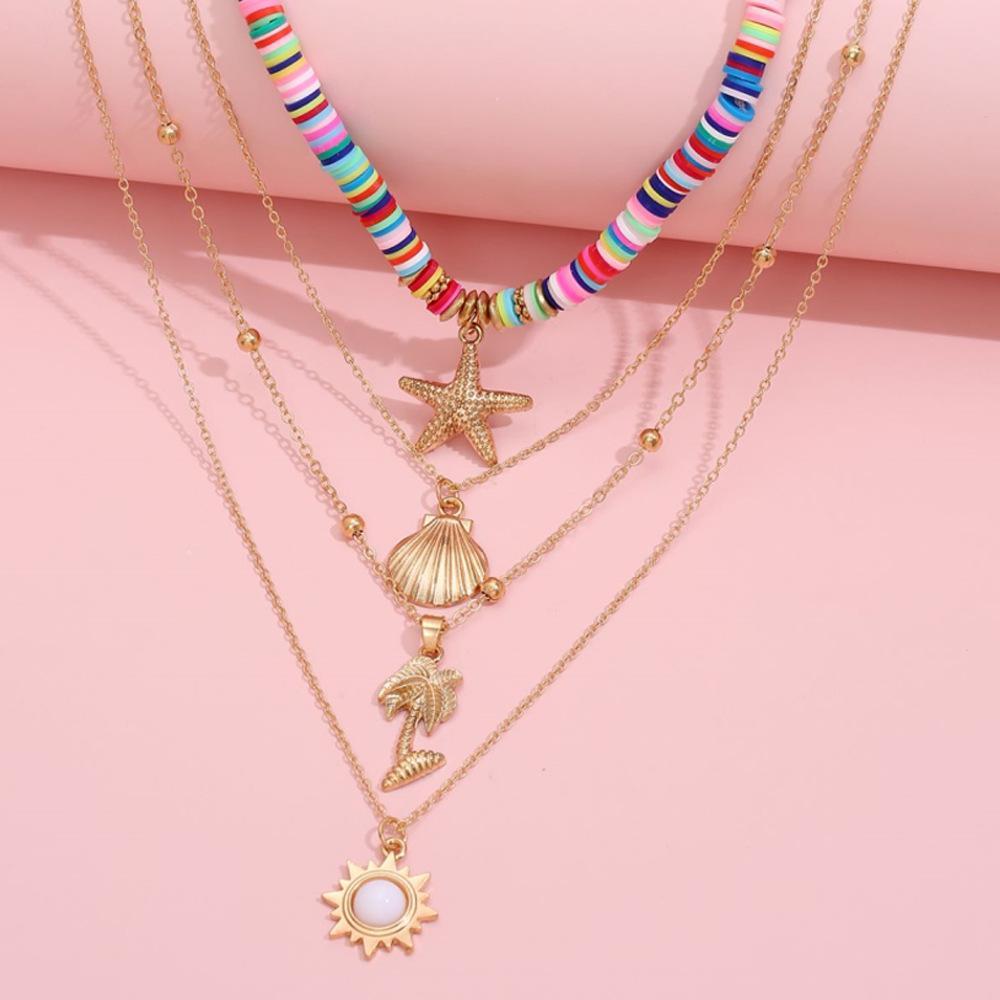 Ensemble de colliers étoiles de mer et coquillages vintages en argile molle