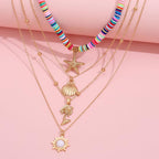 Ensemble de colliers étoiles de mer et coquillages vintages en argile molle