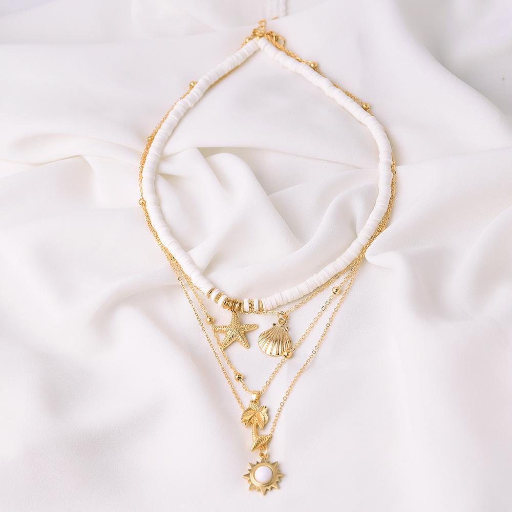 Ensemble de colliers étoiles de mer et coquillages vintages en argile molle