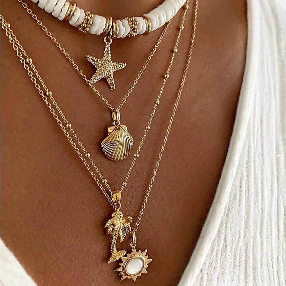 Ensemble de colliers étoiles de mer et coquillages vintages en argile molle