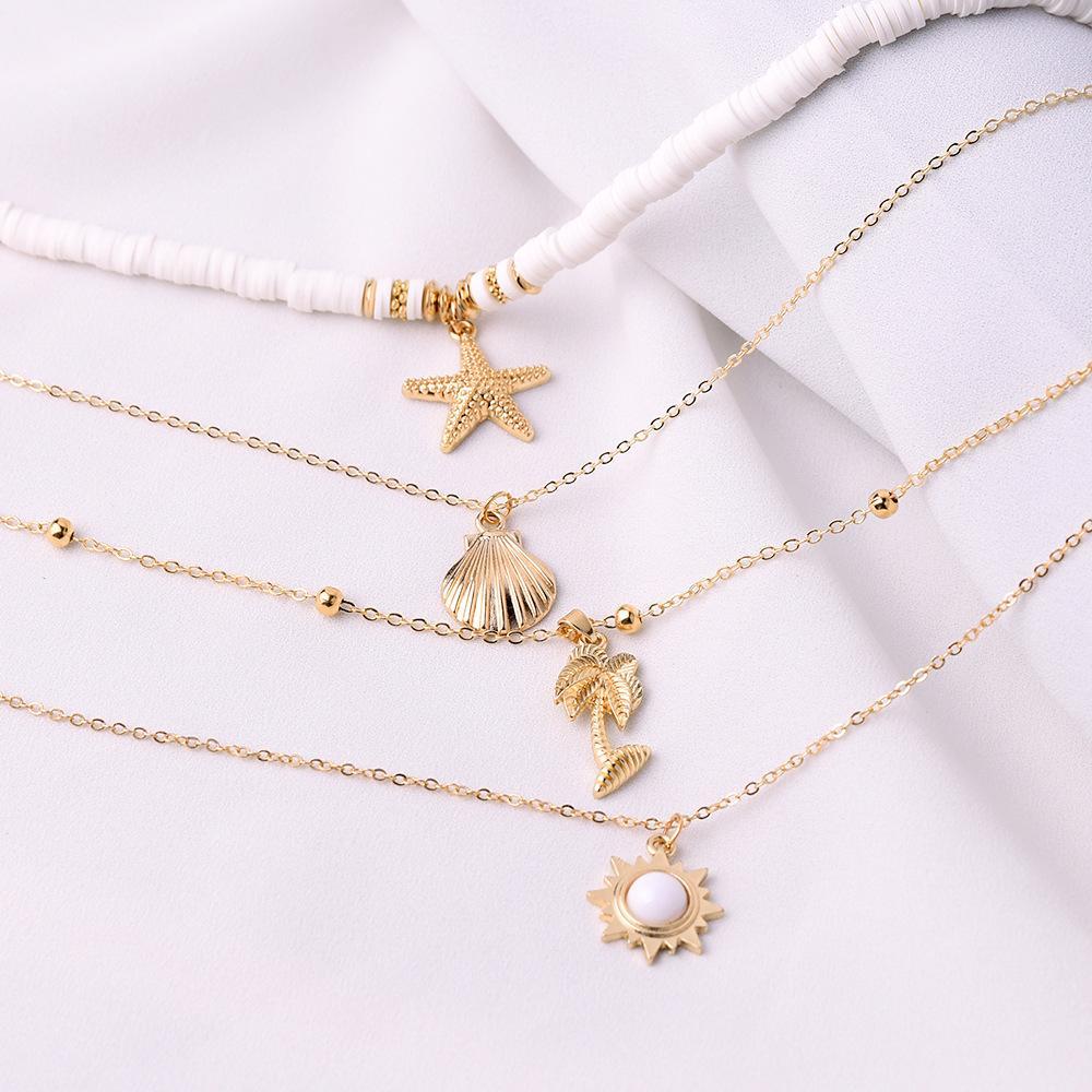 Ensemble de colliers étoiles de mer et coquillages vintages en argile molle